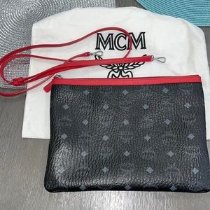 MCM Black/Red Crossbody Bag comes with Duster Bag.